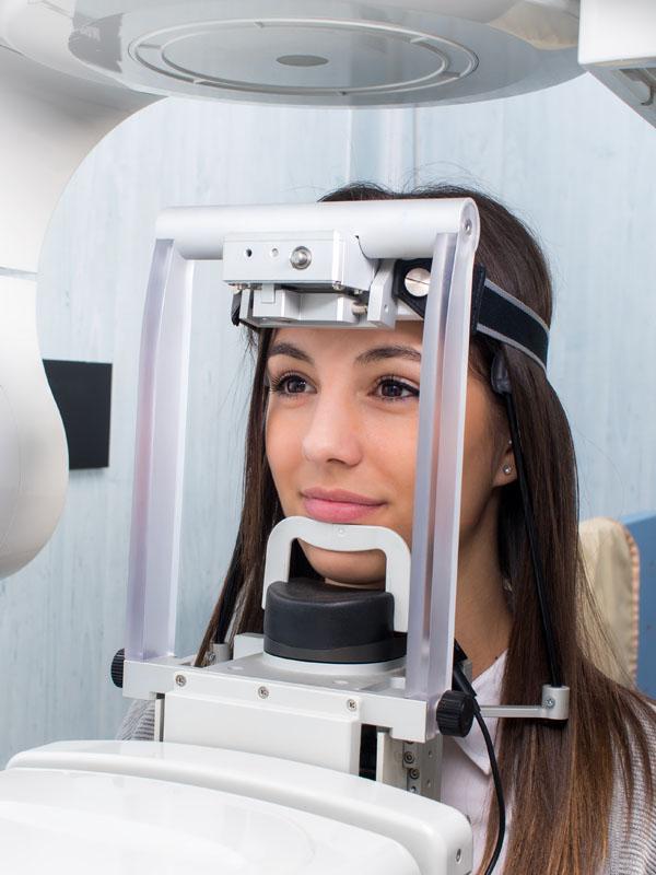 Woman undergoing dental x-ray